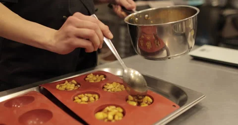 Preparation of apple desserts in a silicone baking tray. Stock Footage 263487056