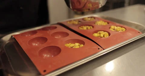 Preparation of apple desserts in a silicone baking tray. Stock Footage 263487199