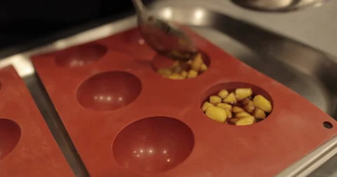Preparation of apple desserts in a silicone baking tray. Stock Footage 263487586