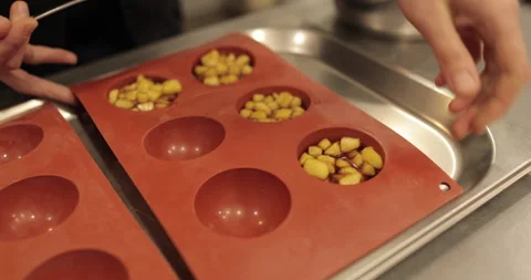 Preparation of apple desserts in a silicone baking tray. Stock Footage 263488028