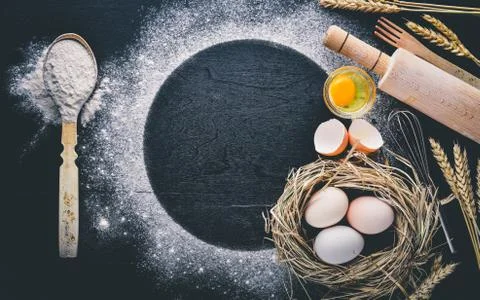 Preparation for baking. Eggs with a rolling pin. On the stone table. Free spa Stock Photos