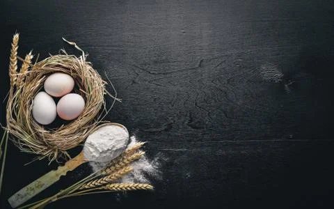 Preparation for baking. Eggs with a rolling pin. On the stone table. Free spa Stock Photos