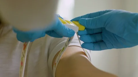 Preparation for blood sampling for analysis Stock Footage 112216827