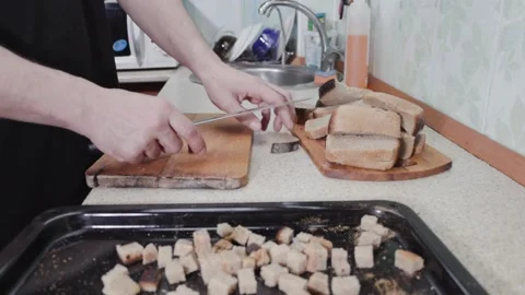 Preparation of breadcrumbs from rye bread Stock Footage 232626338
