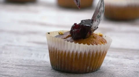 Preparation of cake. Add the stuffing. Close-up. Stock Footage 57812063