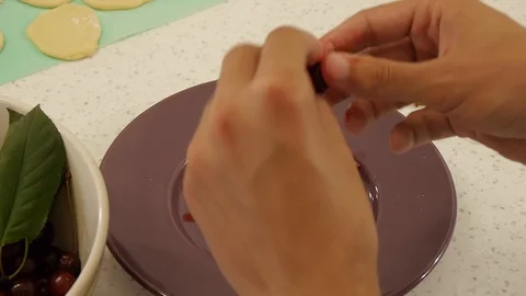 Preparation of cherries for jam preparation Stock Footage 122096569