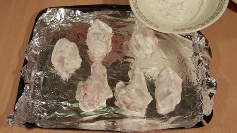 Preparation chicken wings for baking in the oven Stock Footage 70993878
