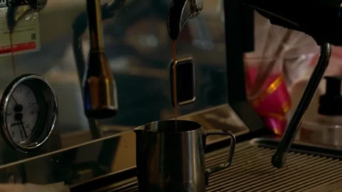 Preparation of coffee using a professional coffee machine Stock Footage 246798831