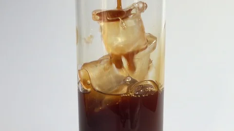 Preparation of cold espresso coffee with ice. Stock-Footage 129306575