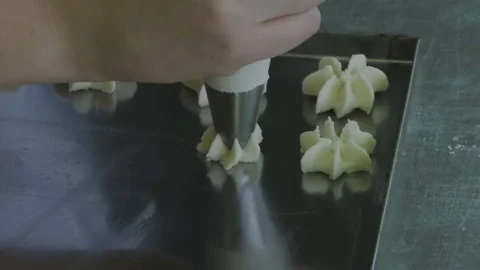 Preparation of cookies on a sheet of pastry 库存影片 70595873