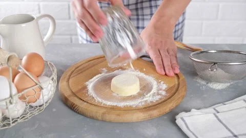 Preparation for cooking cheesecakes with cottage cheese in flour with handwork Stock Footage 149619033