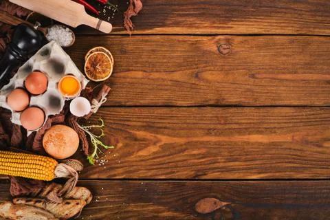 Preparation for cooking. Egg, flour, bread. Top view. On a wooden background. Stock Photos
