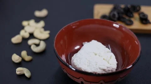 Preparation of cottage cheese for breakfast. Stock-Footage 146331852
