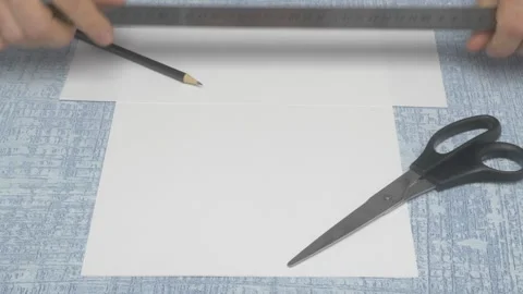 Preparation for a Craft Project Using Paper and Scissors A Creative Guide and Stock Footage 283639619