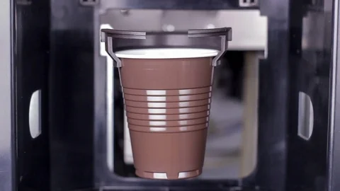 Preparation cycle of cappuccino drink inside coffee vending machine Stock Footage 79265374