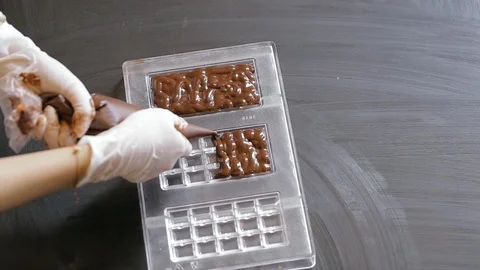 Preparation of dark chocolate bars Stock Footage 94229379