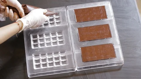 Preparation of dark chocolate bars Stock Footage 94229407