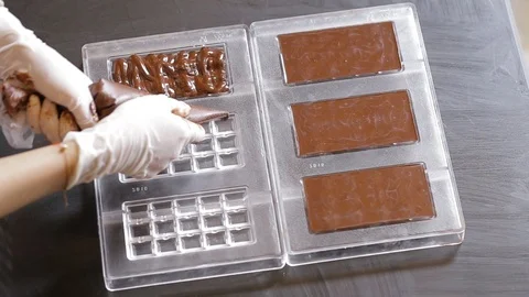Preparation of dark chocolate bars Stock Footage 94229441