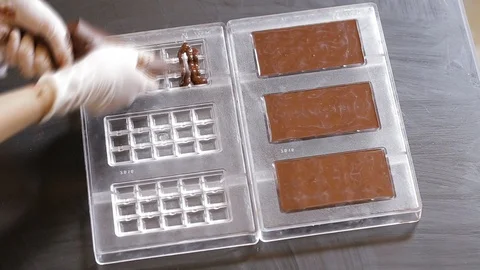 Preparation of dark chocolate bars Stock Footage 94229562