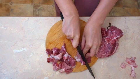 Preparation of diced meat on surface for kebab skewering process Stock Footage 329059081
