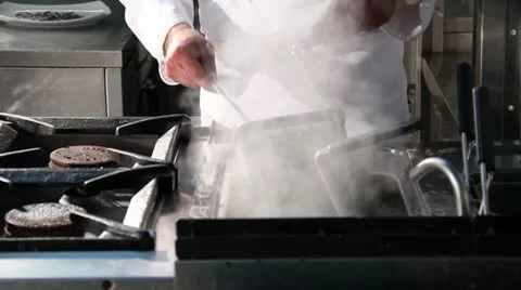 Preparation of a dish in the kitchen Video stock 12032579