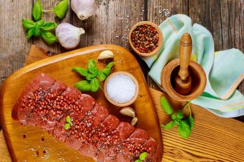 Preparation dish from raw beef and spices. Stock Photos