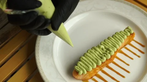 Preparation of dishes. The chef prepares a dish on a plate. Stock Footage 113223766