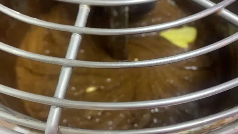 Preparation of dough in automatic machine. Dough making equipment kneads dough Stock Footage 263326643