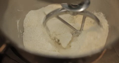 Preparation of dough in a professional electric mixer. Stock Footage 250467553