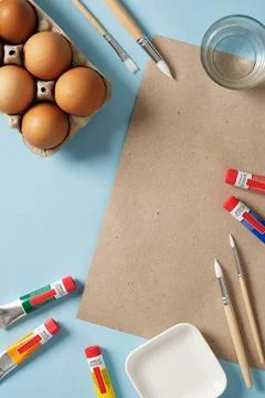 Preparation for Easter celebration. Painting Easter eggs with acrylic pigment Stock Photos