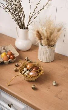 Preparation for Easter. painted Easter eggs in kitchen on wooden countertop Stock Photos