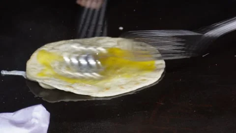 Preparation of an egg roll 스톡 동영상 326351543