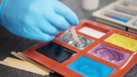 Preparation of epoxy colour component for mixing with other pigments, stirring Stock-Footage 284341147