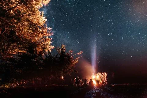 Preparation of evening dinner at stake. Camp kitchen in a mountains by the sea. Stock Photos
