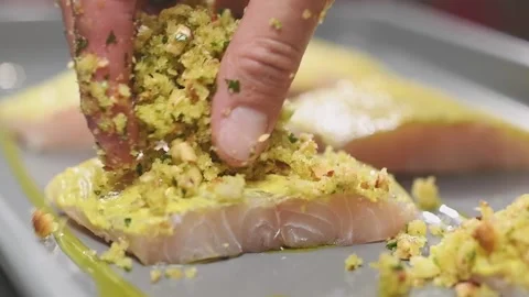 Preparation of fillet fish with bread crumbs. Stock Footage 153457647
