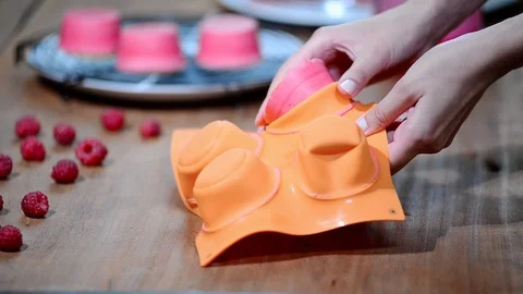 Preparation French raspberry mousse cake with pink mirror glaze. Stock Footage 92799491