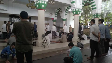Preparation for Friday prayers at a mosque  Stock Footage 197524234