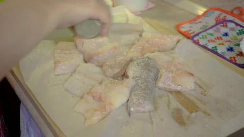 Preparation of fried fish in the kitchen Stock Footage 93215927