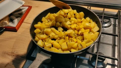 Preparation of fried potatoes in a pan Stock Footage 133251617