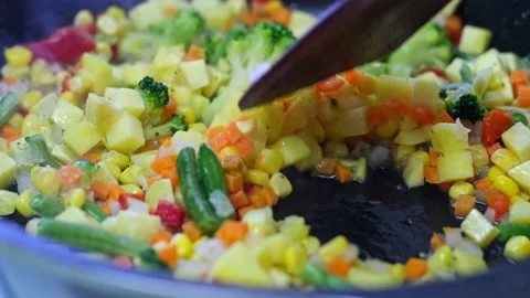 Preparation of frozen vegetable mixture Stock Footage 202275907