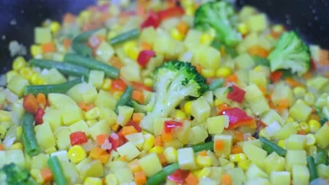 Preparation of frozen vegetable mixture Stock Footage 202275949
