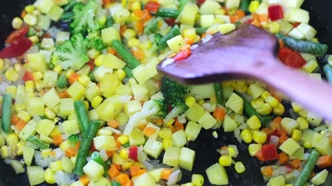 Preparation of frozen vegetable mixture Stock Footage 202276043