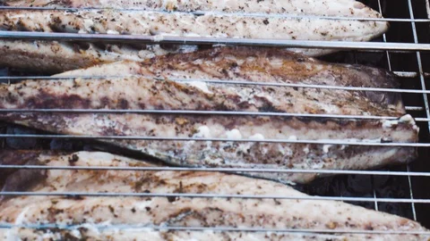 Preparation of grilled fish close up. Stock Footage 129771497