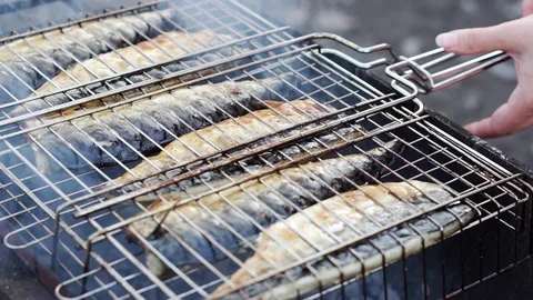 Preparation of grilled fish close up. Stock Footage 129771547
