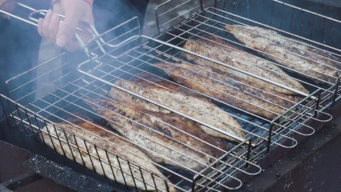 Preparation of grilled fish close up. Stock Footage 129771558