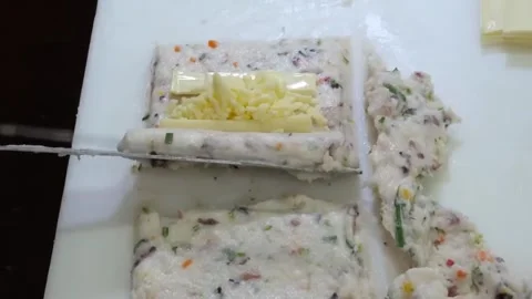 Preparation of Handmade Korean Fish Cake (Eomuk) with Cheese and Vegetables Stock Footage 337374650