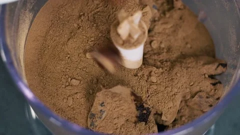 Preparation hazelnuts in a blender. Hazelnuts with cocoa, chocolate and sugar Stock Footage 132501142
