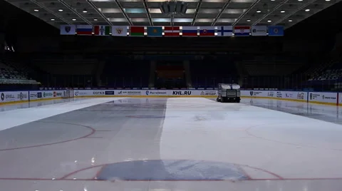 Preparation ice the game . The machine floods the ice. Hockey arena Vídeo Stock 61507665