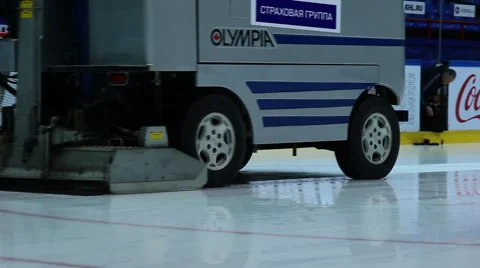 Preparation ice the game . The machine floods the ice. Hockey arena Stock Footage 61507707