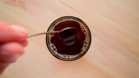 Preparation of instant coffee, close-up top view Stock-Footage 168433053